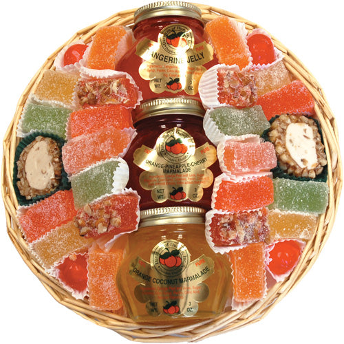 Assorted candies and preserves in a woven basket called The Treat Combo Basket from Hyatt Fruit Company