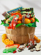 Fruit Basket including oranges, grapefruit, gummies and assorted chocolate candies in a Florida grove basket.